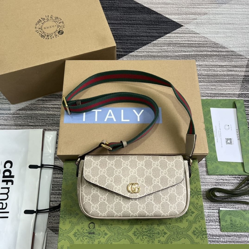 G*u*i top handle bags